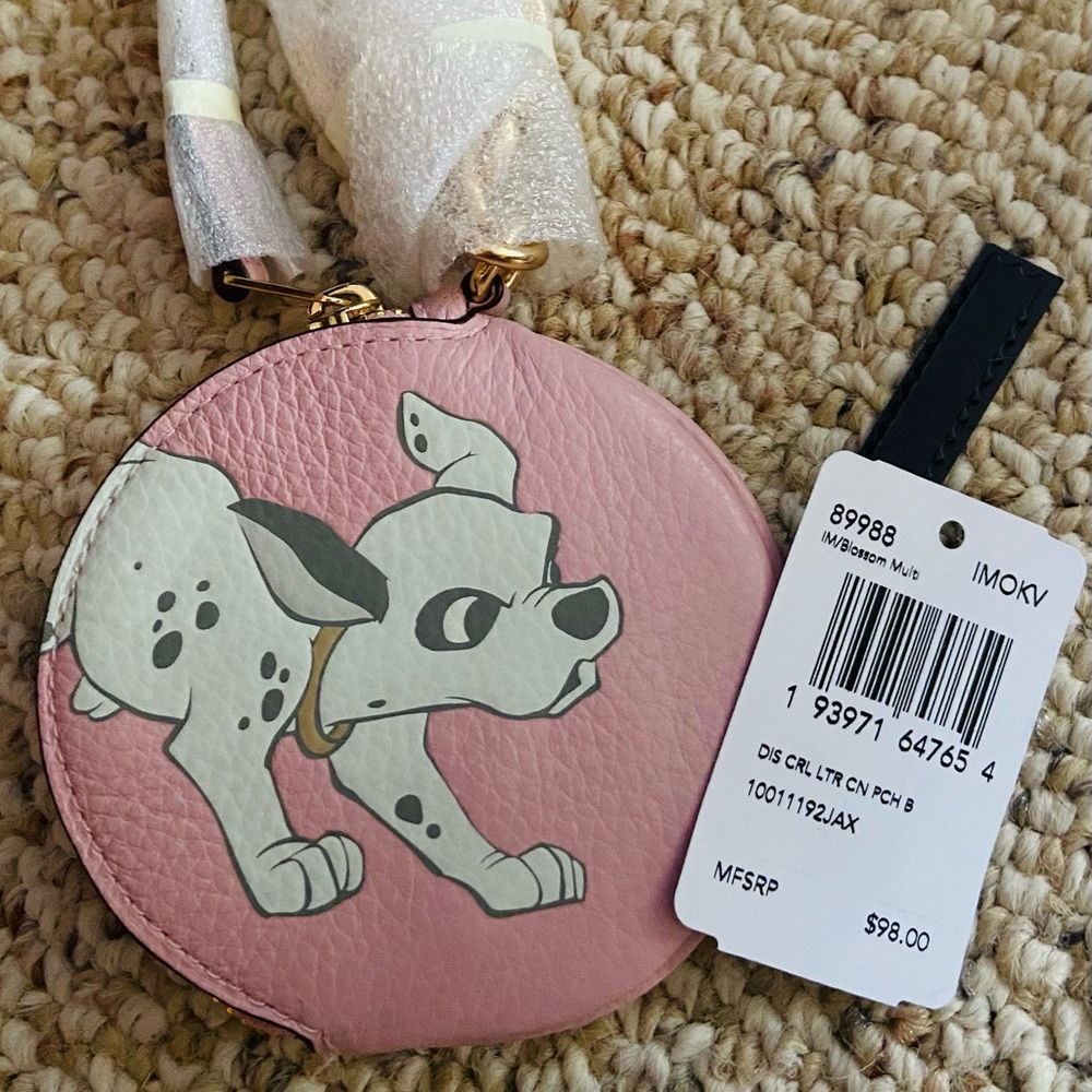 NWT Coach Disney Dalmations coin purse.